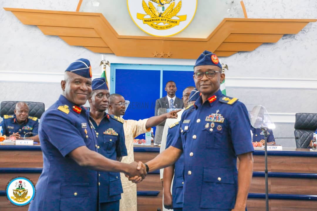 PERSONNEL WELFARE: NAF PROMOTES 4 SENIOR OFFICERS TO RETIREMENT